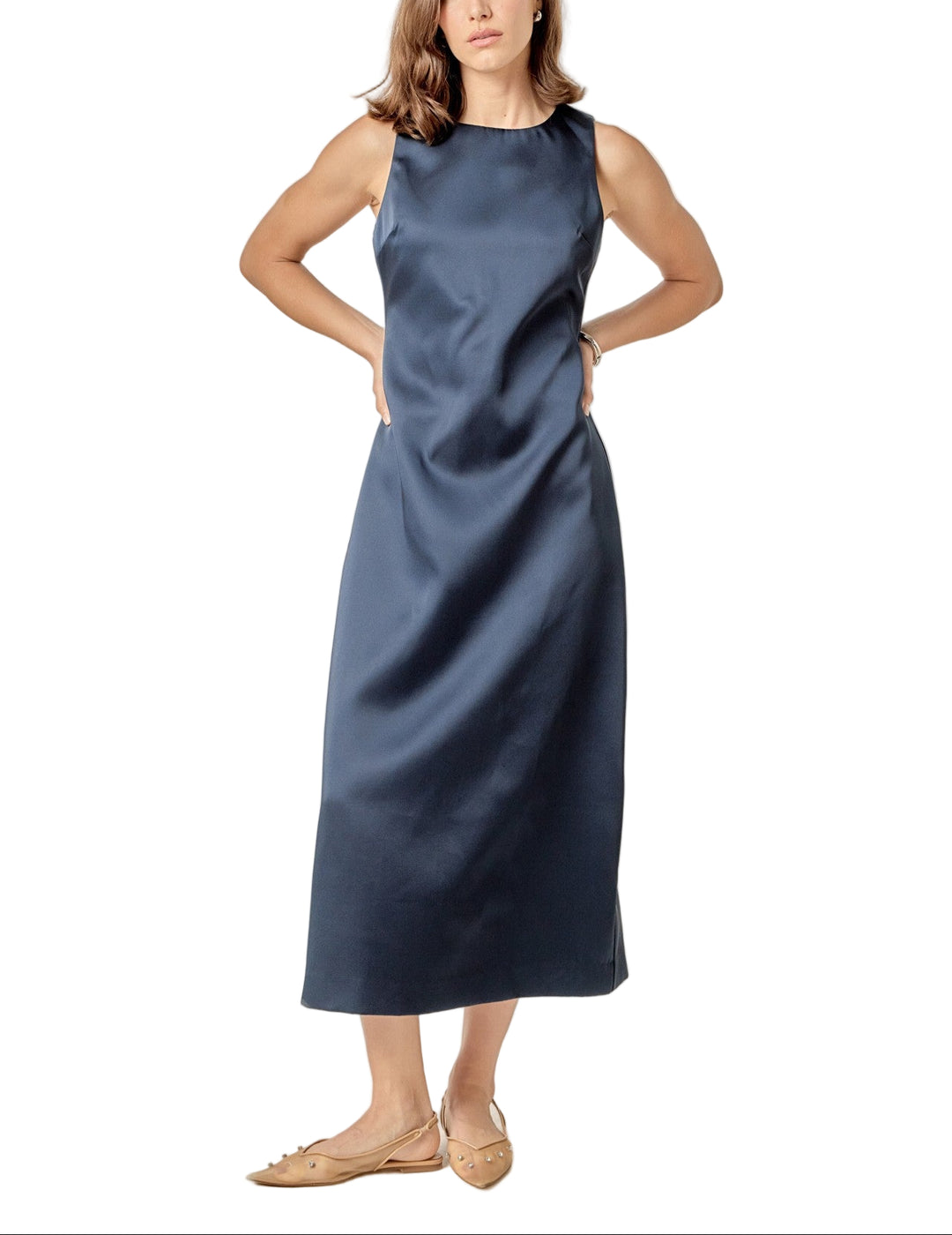 Slip into the Margo Satin Midi Dress and let the playful charm take over. This sleeveless beauty shines with a smooth satin finish that catches the light perfectly as you move. Its flattering midi length makes it easy to dance the night away or turn heads at any occasion. Effortless elegance meets fun in one stunning dress!