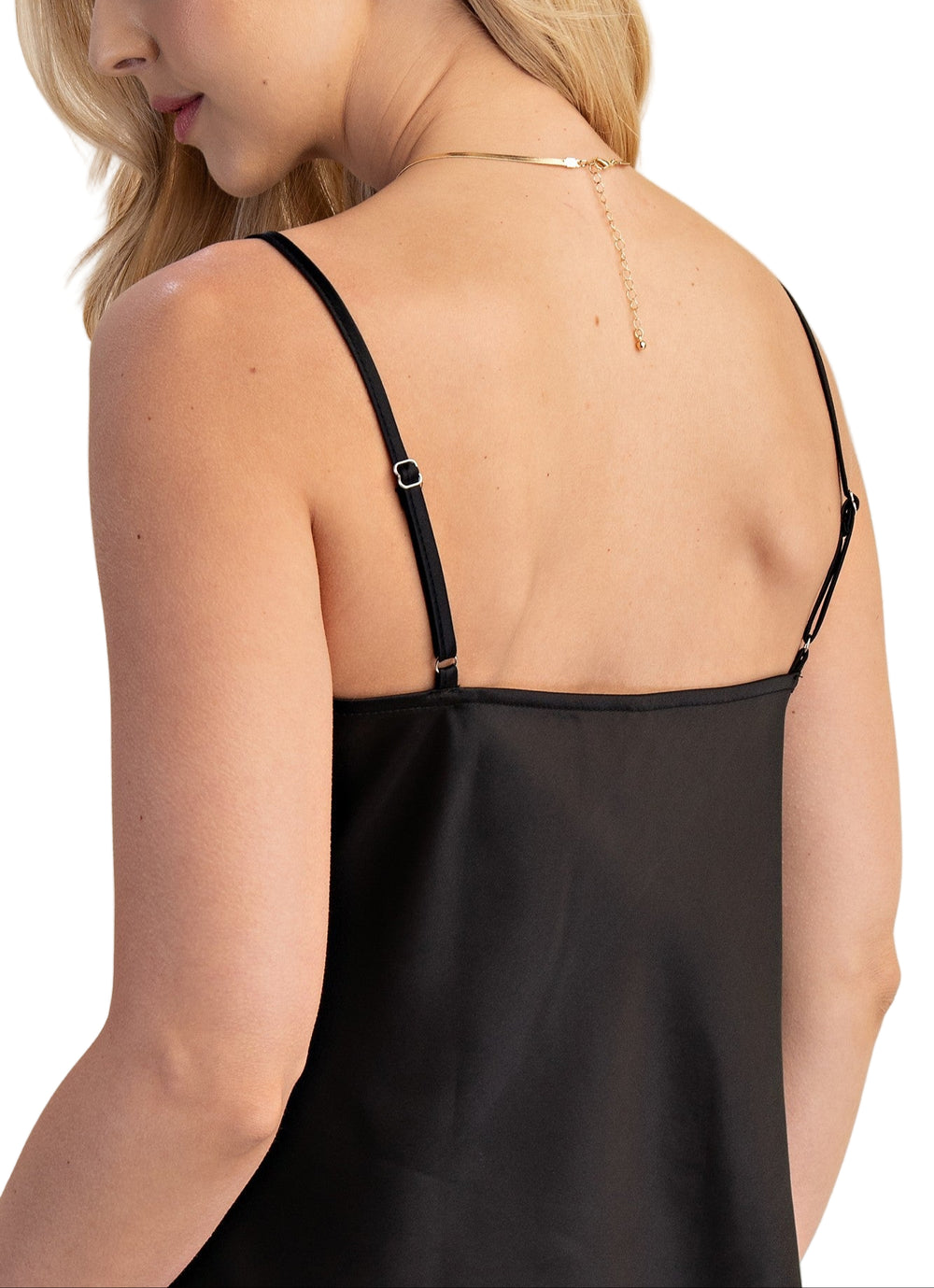 Slip into something silky with this Satin Cami in Black. Its smooth, lustrous fabric feels like a dream against your skin, perfect for both lounging and layering up for a night out. The sleek black hue pairs effortlessly with everything, making it your new go-to for adding a touch of effortless elegance and a playful vibe to any outfit.