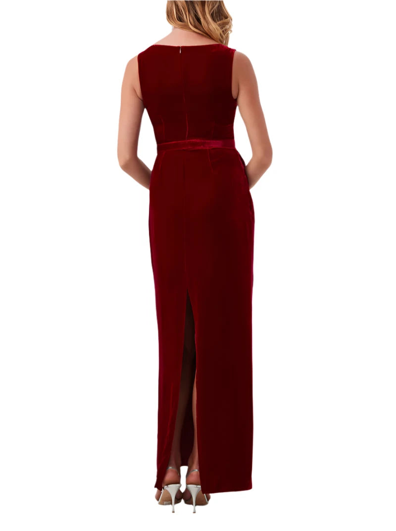 Featuring a classic boatneck and a flattering belted waist, this sleeveless velvet maxi dress has a sleek column silhouette for a timeless look at any event.⁠