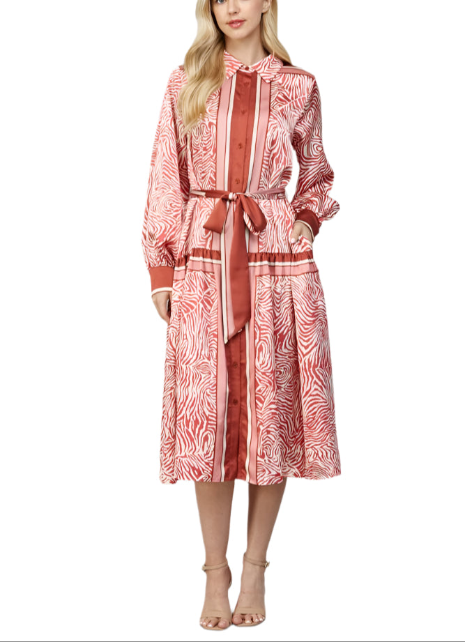 Step out in style with the Lee Animal Print Shirt Dress in Ivory Multi. Featuring a playful animal print and a flattering tie waist, this dress effortlessly combines comfort and chic.