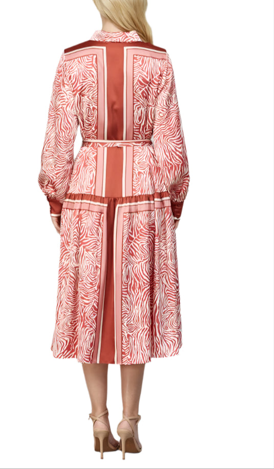 Step out in style with the Lee Animal Print Shirt Dress in Ivory Multi. Featuring a playful animal print and a flattering tie waist, this dress effortlessly combines comfort and chic.