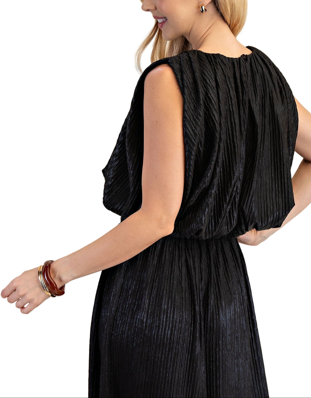 Step out in style with the Bailey Sleeveless Top and Pant Set, featuring a bubbly, sleeveless top paired with flowy pants for a carefree, playful look. The top’s unique silhouette adds a fun flair, while the relaxed pants keep you comfortable all day long. Perfect for sunny days or casual nights, this set makes effortless chic feel like a breeze.