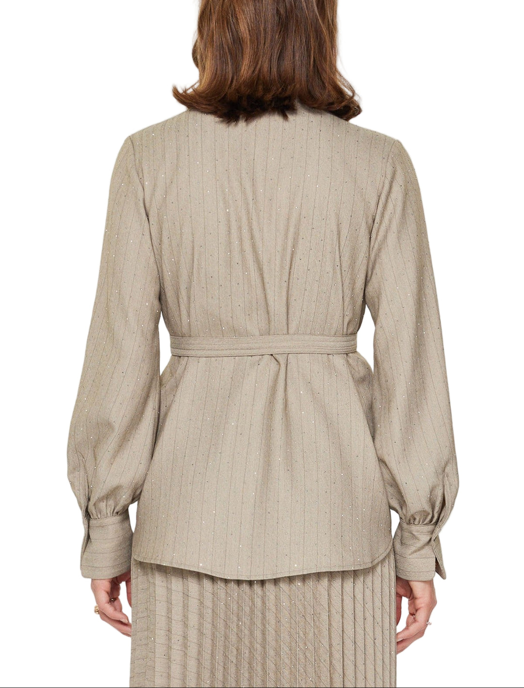 Elevate your everyday style with the Laney Pinstriped Belted Top, where classic vertical stripes meet modern sparkle. Delicate rhinestone beading adds just the right amount of shimmer without stealing the show, while the cinched waist creates a flattering silhouette that works for the office or weekend outings. Versatile, chic, and just a touch glamorous—this top is your new go-to piece for looking polished with personality.