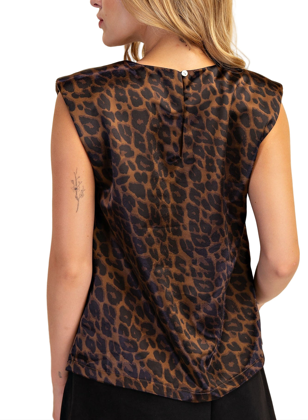 Elevate your style with the Braylee Shoulder Padded Top in Brown! This chic top adds a playful twist to your wardrobe with its structured shoulder pads, giving you an effortlessly confident silhouette. Perfect for making a bold statement, it pairs easily with your favorite jeans or skirts for a look that’s both fun and fierce.