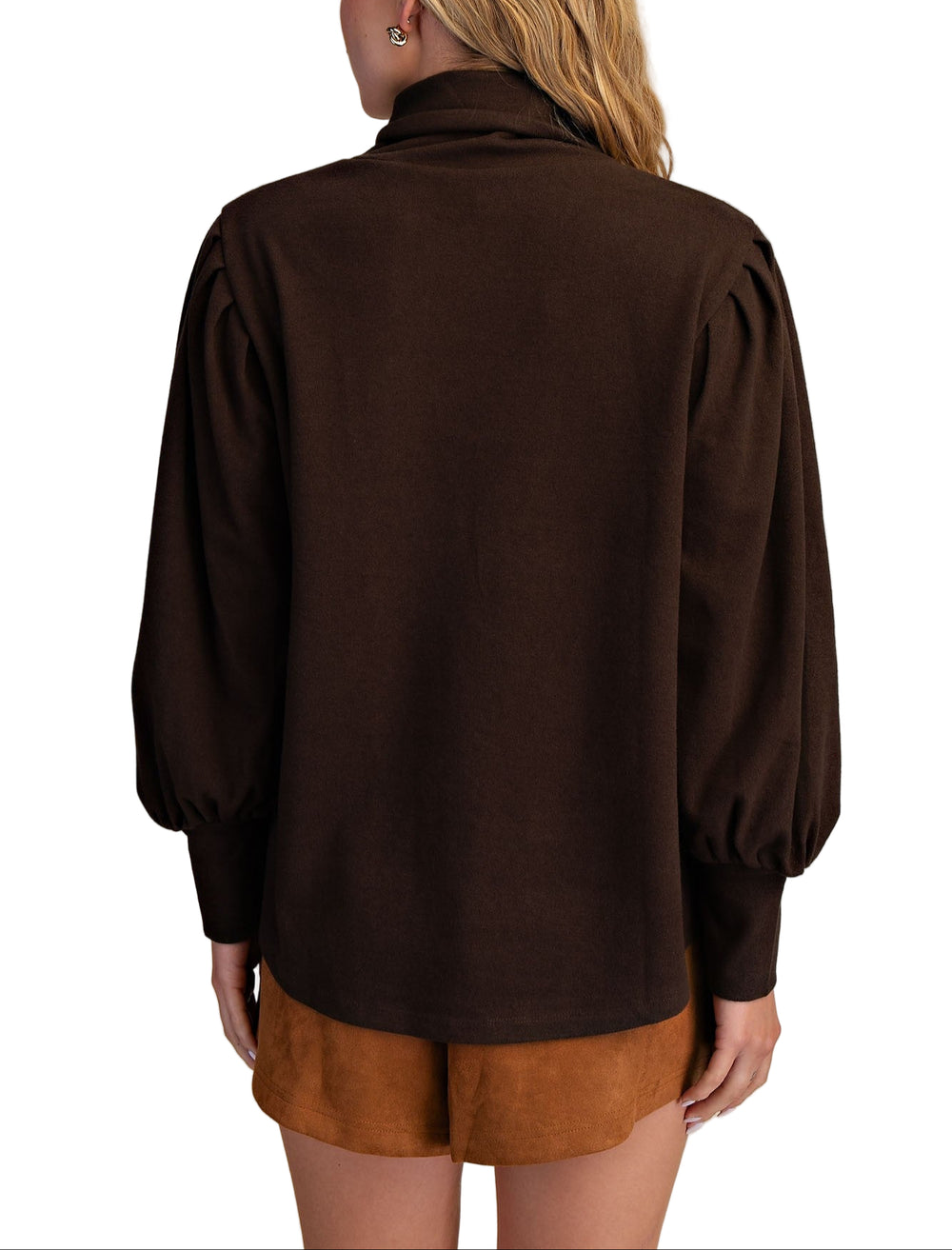 Meet the Erin Sweater, your new cozy companion for chilly days. This long sleeve turtleneck knit wraps you in warmth with a snug fit that’s perfect for layering or wearing solo. Its soft, stretchy fabric feels like a gentle hug, while the playful turtleneck adds a fun twist to your everyday wardrobe. Whether you’re sipping hot cocoa or strolling through crisp autumn air, Erin keeps you stylishly comfy and ready for anything.