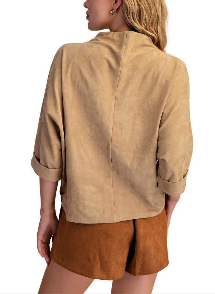 Elevate your everyday look with the Laurie Mock Neck Top, featuring a playful mock neck and flattering quarter sleeves. This top adds a fun twist to your wardrobe while keeping things effortlessly chic and comfortable. Perfect for layering or wearing solo, it’s your new go-to for a dash of style with ease