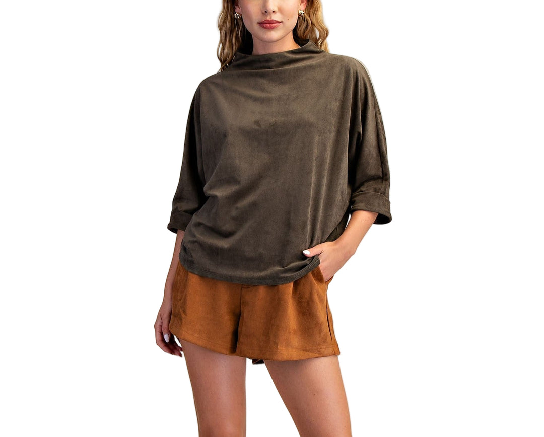 Elevate your everyday look with the Laurie Mock Neck Top, featuring a playful mock neck and flattering quarter sleeves. This top adds a fun twist to your wardrobe while keeping things effortlessly chic and comfortable. Perfect for layering or wearing solo, it’s your new go-to for a dash of style with ease