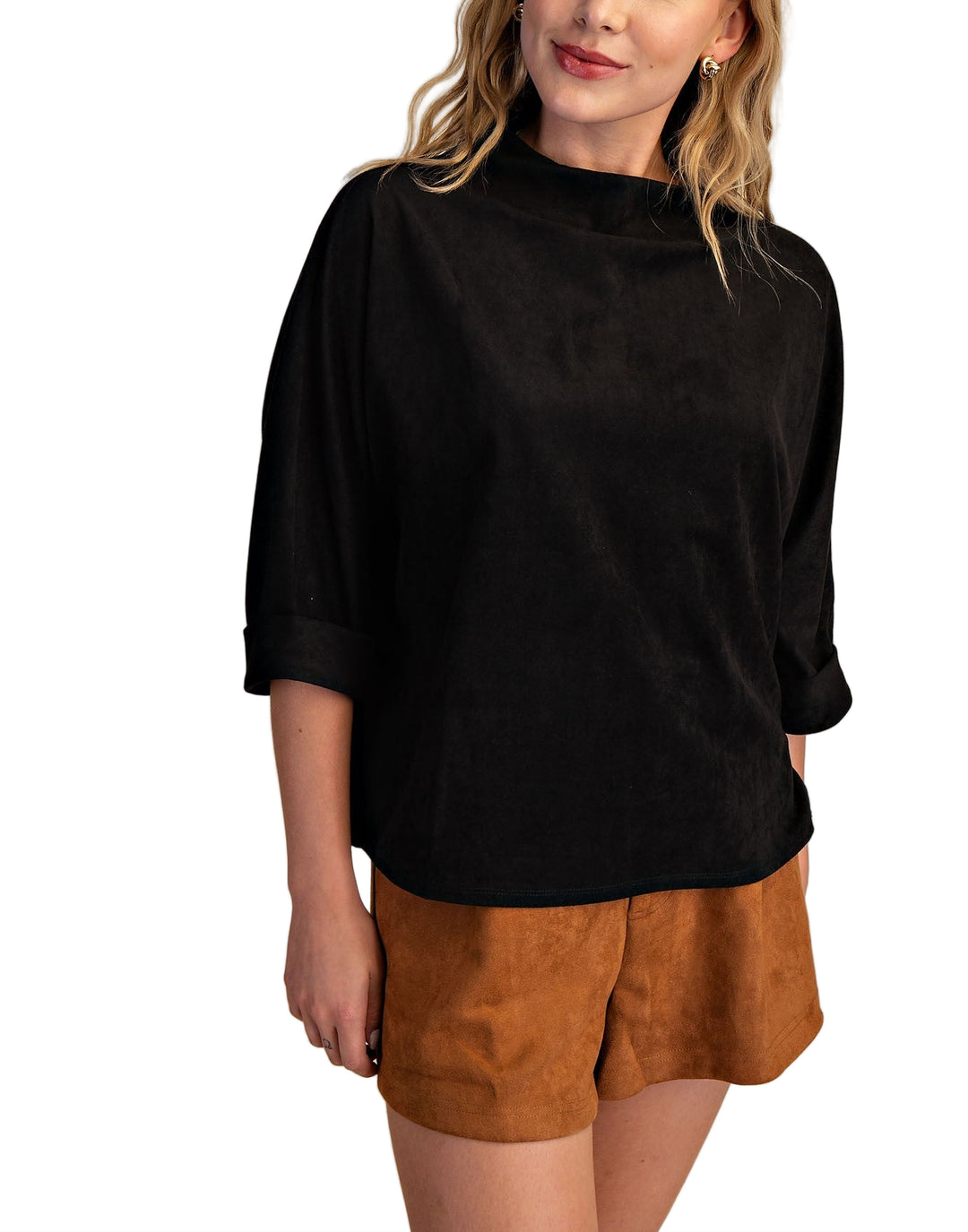 Elevate your everyday look with the Laurie Mock Neck Top, featuring a playful mock neck and flattering quarter sleeves. This top adds a fun twist to your wardrobe while keeping things effortlessly chic and comfortable. Perfect for layering or wearing solo, it’s your new go-to for a dash of style with ease