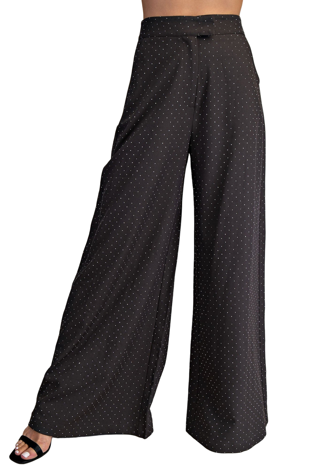 Step out in style with the Tina High Waisted Wide Pants! These breezy, wide-leg pants hug your waist just right, giving you an effortlessly chic silhouette. Perfect for twirling through your day or lounging with flair, they combine comfort with a bold, playful vibe. Slip them on and let your legs do the talking!