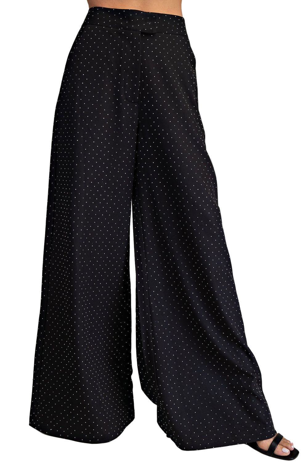 Step out in style with the Tina High Waisted Wide Pants! These breezy, wide-leg pants hug your waist just right, giving you an effortlessly chic silhouette. Perfect for twirling through your day or lounging with flair, they combine comfort with a bold, playful vibe. Slip them on and let your legs do the talking!