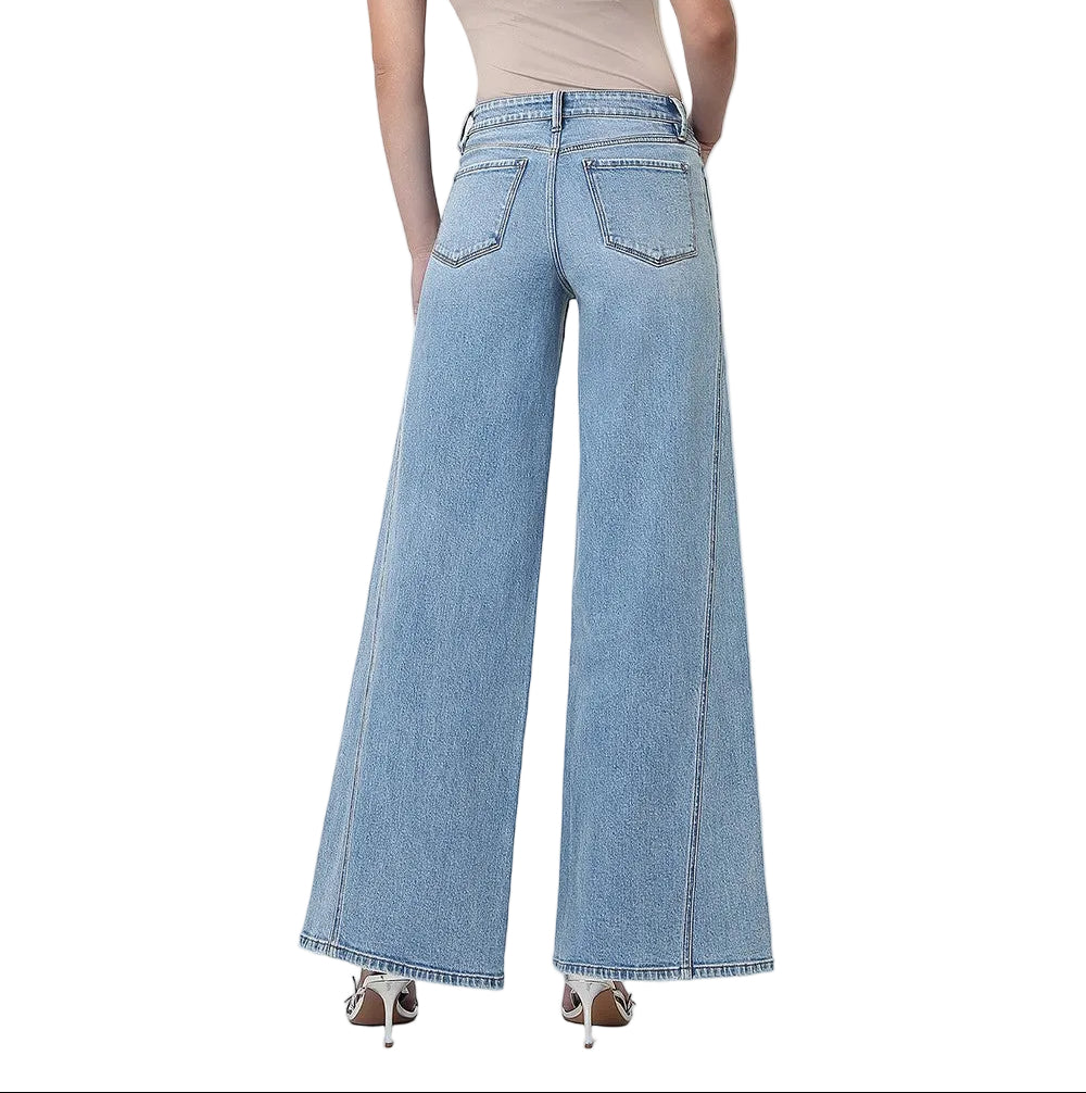 Elevate your denim game with these mid-rise palazzo jeans that strike the perfect balance between comfort and style. The light wash gives them an effortlessly cool, lived-in vibe that pairs with everything from sneakers to heels. The twisted seam detail adds visual interest and a modern edge that sets them apart from basic denim. With a relaxed, wide-leg silhouette, they're ideal for creating laid-back looks that still feel put-together. Whether you're running errands or heading out for the evening, these v