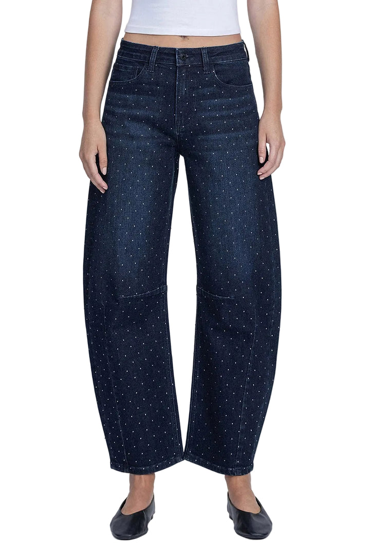 Make a statement in these show-stopping barrel jeans that blend vintage vibes with modern sparkle. The high-rise cut flatters your silhouette while rhinestone embellishments catch the light with every move, transforming an everyday denim staple into a conversation-starting piece. Perfect for nights out or whenever you want to add a touch of glam to your look.