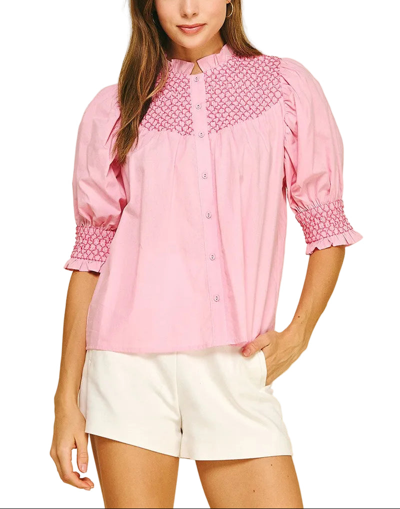 Elevate your everyday style with the Jayden Embroidered Top—a charming button-down that blends classic sophistication with whimsical flair. Featuring intricate embroidered details that catch the light just right, this versatile piece transitions seamlessly from casual weekends to polished workdays. The crisp fabric and tailored fit ensure you'll feel confident and comfortable, whether you're dressing it up with tailored trousers or keeping it relaxed with your favorite jeans. 