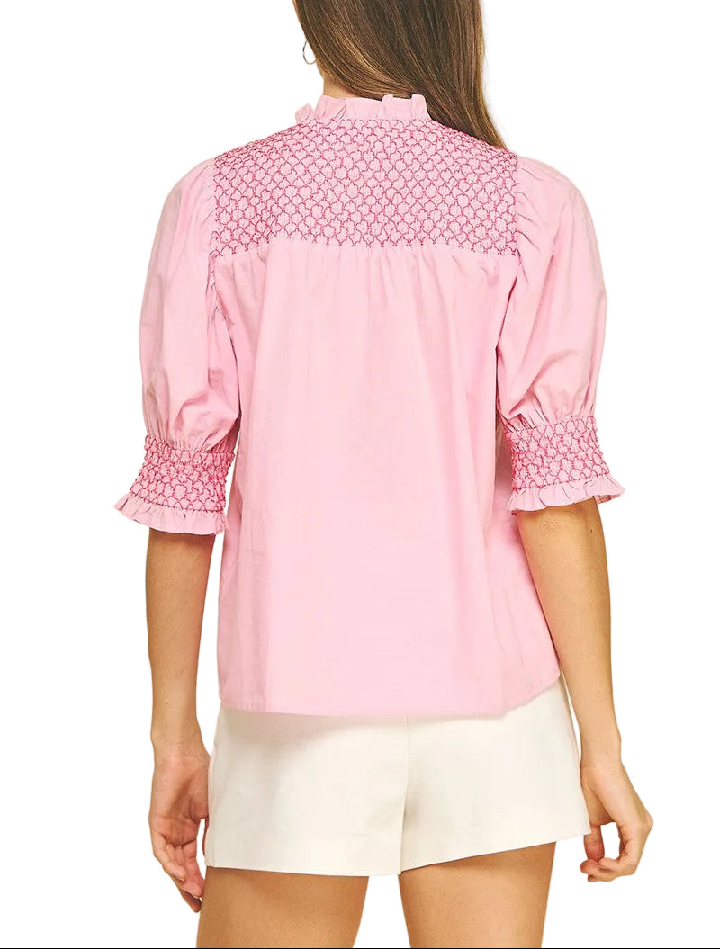 Elevate your everyday style with the Jayden Embroidered Top—a charming button-down that blends classic sophistication with whimsical flair. Featuring intricate embroidered details that catch the light just right, this versatile piece transitions seamlessly from casual weekends to polished workdays. The crisp fabric and tailored fit ensure you'll feel confident and comfortable, whether you're dressing it up with tailored trousers or keeping it relaxed with your favorite jeans.