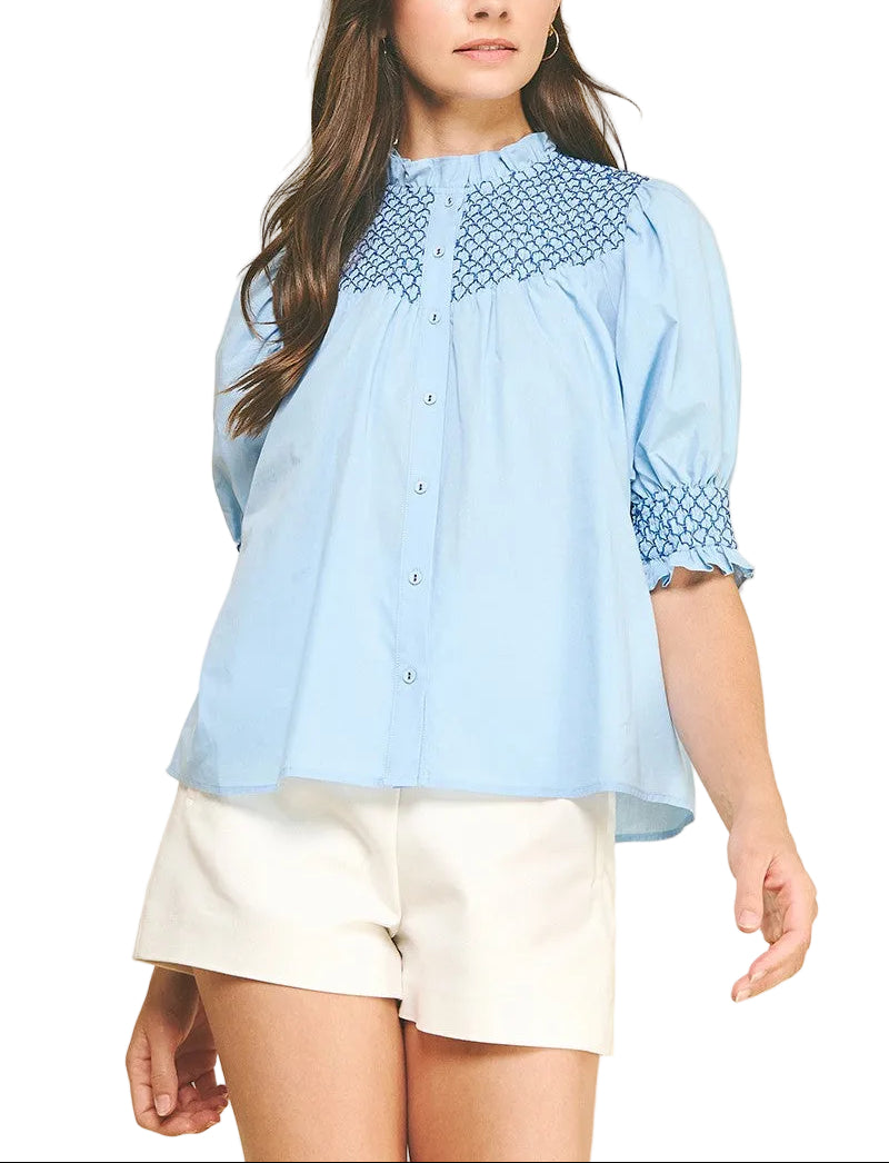 Elevate your everyday style with the Jayden Embroidered Top—a charming button-down that blends classic sophistication with whimsical flair. Featuring intricate embroidered details that catch the light just right, this versatile piece transitions seamlessly from casual weekends to polished workdays. The crisp fabric and tailored fit ensure you'll feel confident and comfortable, whether you're dressing it up with tailored trousers or keeping it relaxed with your favorite jeans. 