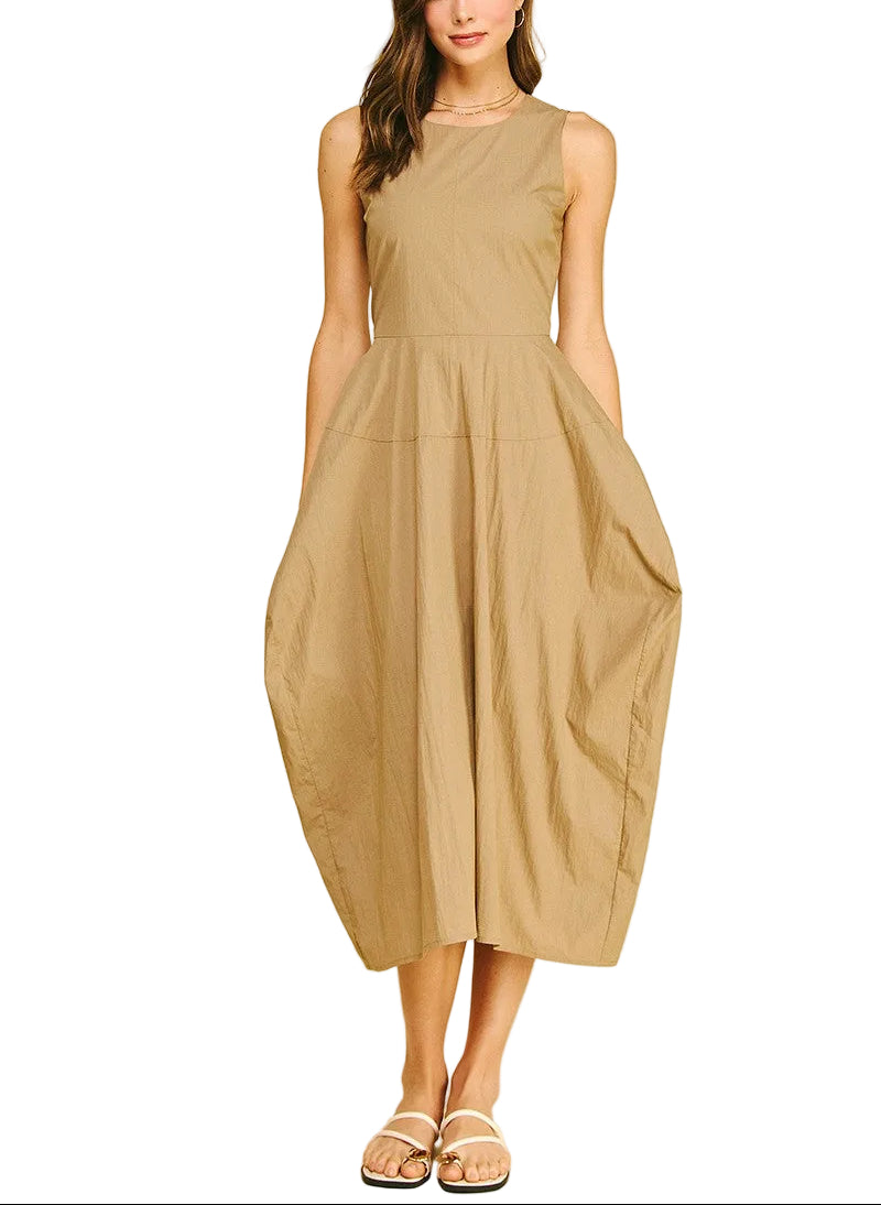 The Jamie Sleeveless Midi Dress is your new go-to for effortless style. This solid midi features a flattering sleeveless cut perfect for layering or showing off on its own. Best part? Functional pockets keep your essentials close without sacrificing the chic silhouette. Dress it up with heels and jewelry or keep it casual with sneakers—this versatile piece transitions seamlessly from day to night.