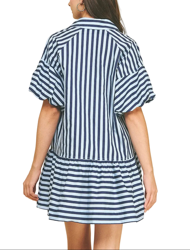 Stripes never go out of style—especially when they're paired with a classic button-down silhouette that's anything but boring. The Coco Stripe Button Down Mini Dress brings effortless charm to your everyday rotation, featuring crisp striped detailing and functional buttons down the front for easy styling versatility. Perfect for dressing up with heels or keeping it casual with sneakers, this mini dress transitions seamlessly from brunch to evening plans. A wardrobe essential that proves timeless patterns ar