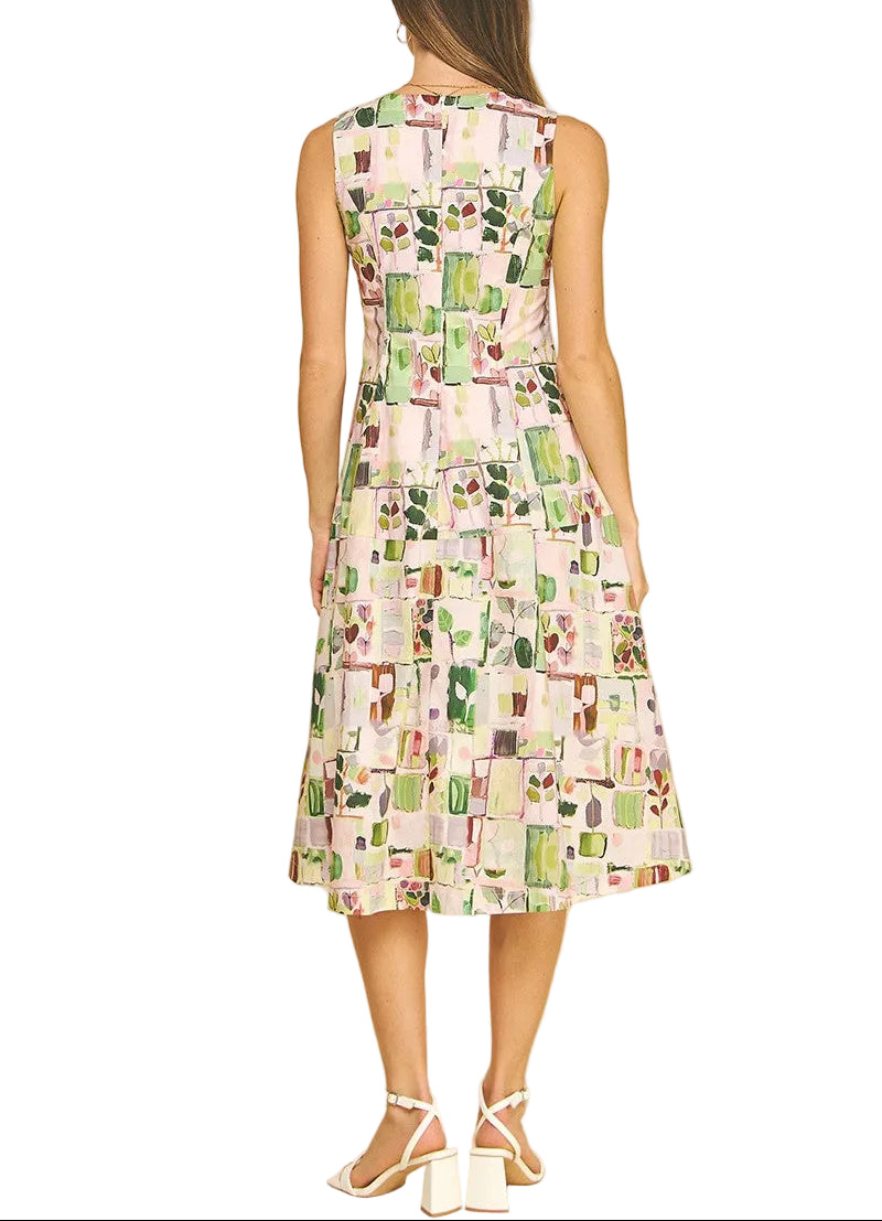 Dive into color with the Cory Watercolor Midi Dress—where artistic flair meets everyday elegance. This sleeveless beauty features a dreamy watercolor print that looks like wearable art, perfect for turning heads at brunch, garden parties, or casual outings. The midi length offers a sophisticated silhouette while keeping things breezy and comfortable. Pair it with sneakers for a laid-back vibe or dress it up with heels for something more polished. A playful piece that proves fashion should be fun!