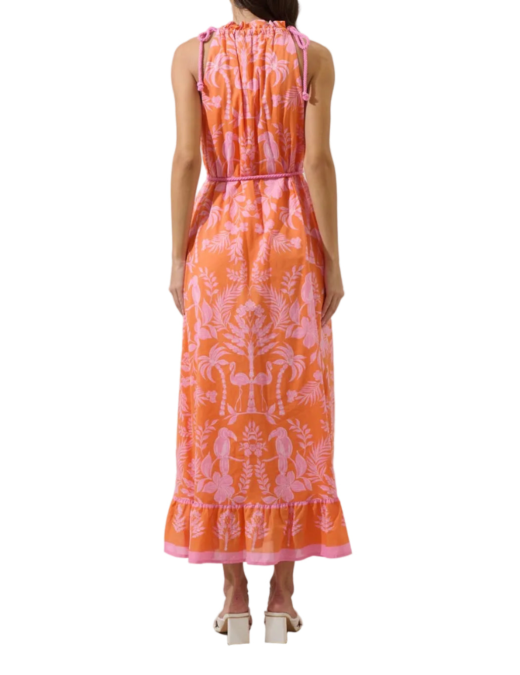 Feel like the charm that you are in the Kimana Floral Kay Halter Neck Maxi Dress. A green floral tropical print creates a sleeveless look with a ruffle halter neck tassel and another one around the waist belt. It has a maxi border with a cute design. Easy to pair with white earring and strappy heels.