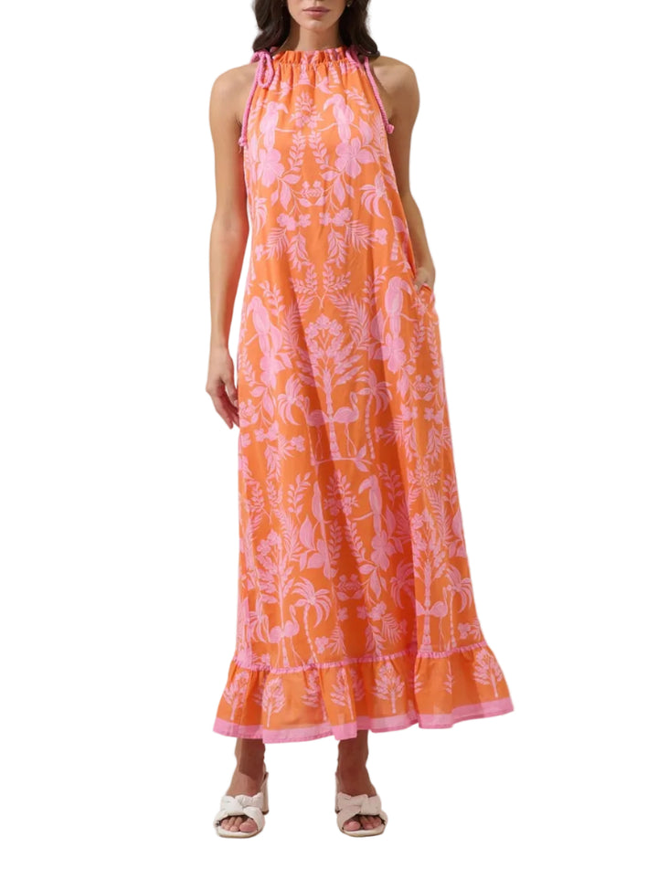 Feel like the charm that you are in the Kimana Floral Kay Halter Neck Maxi Dress. A green floral tropical print creates a sleeveless look with a ruffle halter neck tassel and another one around the waist belt. It has a maxi border with a cute design. Easy to pair with white earring and strappy heels.
