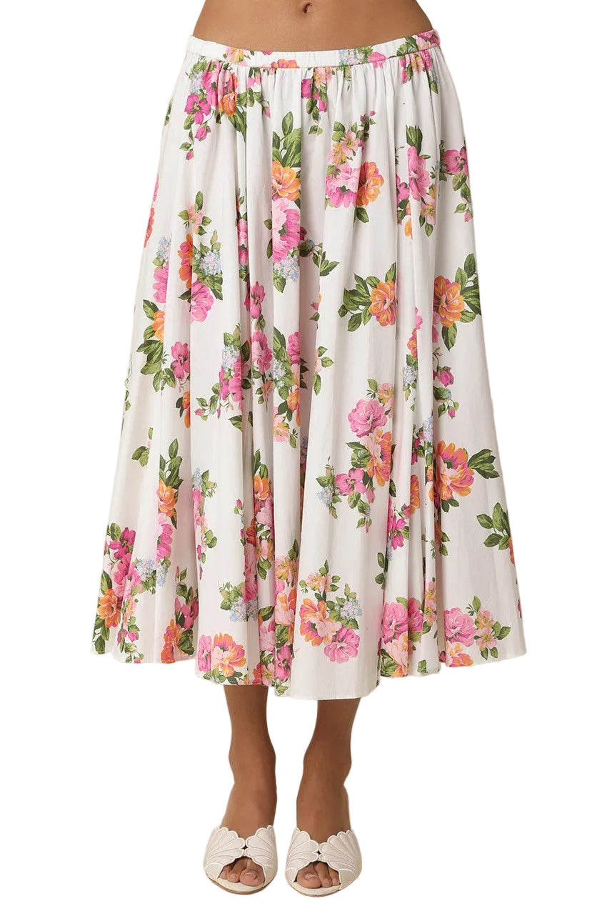 Twirl into spring with the Lilia Pleated Floral Midi Skirt—a romantic piece that brings garden-fresh charm to your everyday rotation. Delicate florals dance across soft fabric, while crisp pleats add movement and dimension with every step. The midi length hits just right for versatile styling, whether you're pairing it with sneakers for weekend wandering or dressing it up for dinner plans. A wardrobe essential that feels anything but basic.