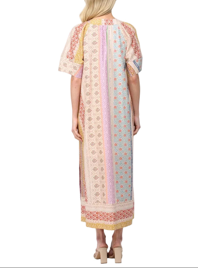 Slip into effortless elegance with the Cecelia Patchwork Print Midi Dress. This breezy kaftan-style piece features a striking patchwork print that tells its own colorful story, paired with a flattering deep V neckline that adds just the right touch of allure. Perfect for everything from beach getaways to casual weekend brunches, this midi dress moves with you in lightweight comfort. The relaxed silhouette keeps things cool and carefree, while the eye-catching pattern ensures you'll turn heads wherever you g