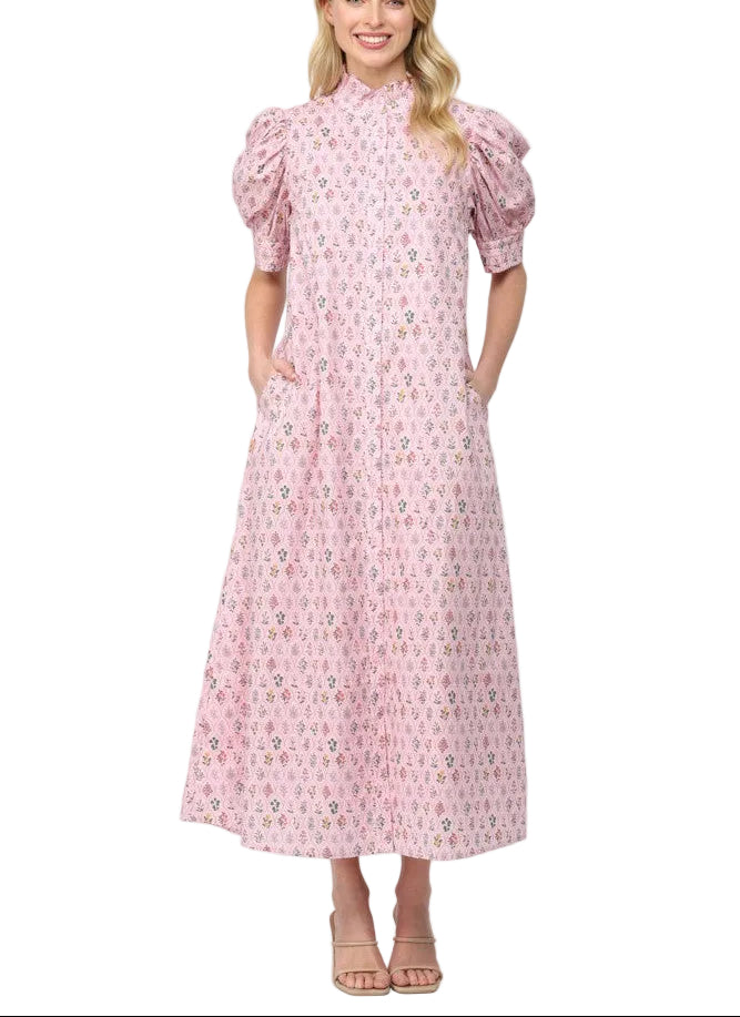 Twirl into spring with the Becca Floral Print Midi Dress! This charming midi features a vibrant floral print that brings garden-fresh style to your everyday rotation. The high ruffled mock neck adds a touch of romantic flair, while the button-down front lets you customize your look—wear it buttoned up for polished elegance or leave it partially undone for effortless charm. Perfect for brunch dates, garden parties, or whenever you want to feel like the main character in your own story.