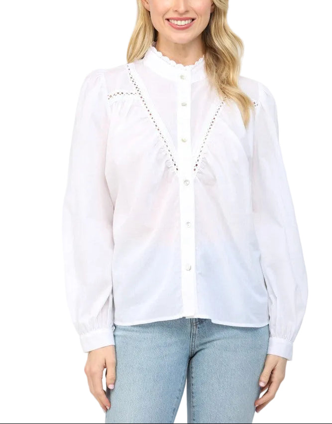Elevate your everyday style with the Cathy Off White Blouse, a charming piece that blends classic sophistication with modern flair. This button-down beauty features a delicate lace insert at the stand collar, adding an unexpected touch of elegance and texture. Perfect for dressing up casual outfits or layering under your favorite sweaters, this versatile blouse transitions seamlessly from office to weekend adventures. 