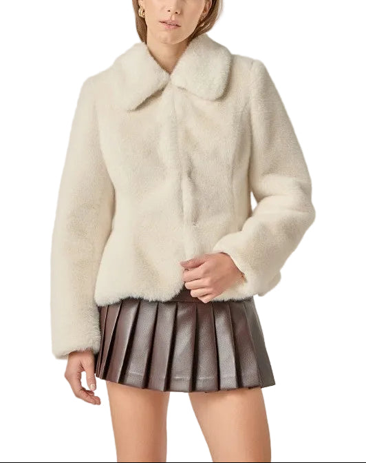 Make a statement with this fabulous peplum faux fur coat! Luxuriously soft faux fur wraps you in cozy glamour, while the flirty peplum hem adds a playful twist that turns heads. Perfect for elevating your winter look from ordinary to absolutely show-stopping. Layer it over your favorite outfit for instant sophistication and fun. Whether you're heading to a night out or just want to feel extra fabulous, this coat delivers drama, warmth, and serious style points.