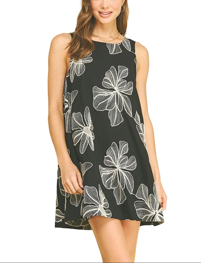 The Marion Floral Embroidered Mini Dress combines timeless elegance with contemporary style. Delicate floral embroidery adorns the bodice and skirt, creating an eye-catching focal point. The classic A-line silhouette flatters all body types while the mini length offers a modern, playful edge perfect for spring and summer occasions. Lightweight fabric ensures all-day comfort, whether you're attending a garden party, brunch, or casual evening out. 