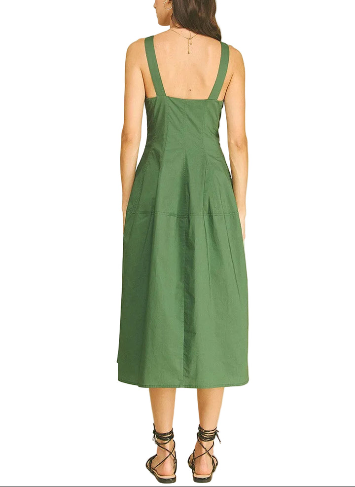 The Marisa Midi Dress offers effortless elegance for any occasion. This sleeveless design features a flattering midi length that skims the body gracefully, making it perfect for warm weather styling. The clean, minimalist silhouette pairs easily with sandals for casual outings or heels for evening events. Versatile and comfortable, it&