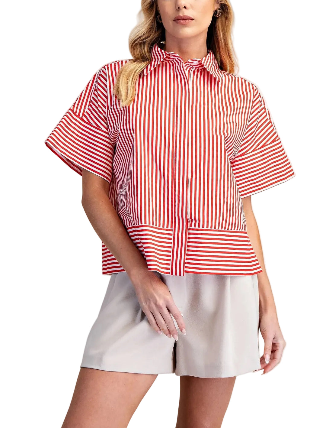 The Brooke Button Down Top in Red Stripe is a versatile wardrobe essential featuring a classic button-front closure and comfortable short sleeves. The crisp red stripe pattern adds visual interest while remaining easy to style with jeans, skirts, or trousers. Perfect for casual outings, work settings, or layering under sweaters and jackets. The structured fit and quality construction make this a reliable piece you'll reach for season after season.
