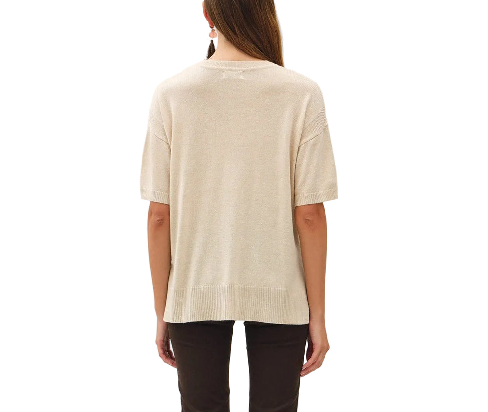 The Bella Boxy Fit Sweater delivers effortless style with its relaxed, oversized silhouette. Crafted for comfort, this short sleeve design is perfect for layering or wearing solo during warmer months. The structured boxy cut flatters all body types while maintaining a contemporary, fashion-forward look. Ideal for casual everyday wear, weekend outings, or dressed up with tailored pieces. Soft and breathable fabric keeps you comfortable throughout the day.