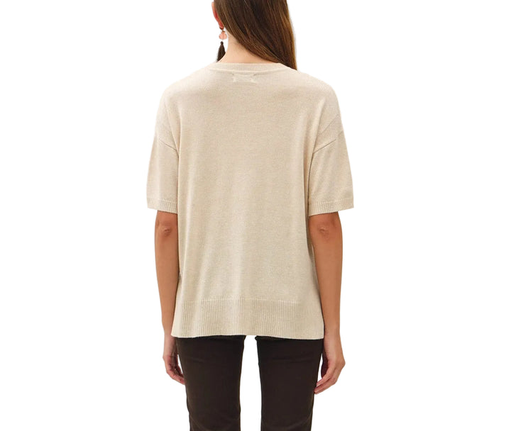 The Bella Boxy Fit Sweater delivers effortless style with its relaxed, oversized silhouette. Crafted for comfort, this short sleeve design is perfect for layering or wearing solo during warmer months. The structured boxy cut flatters all body types while maintaining a contemporary, fashion-forward look. Ideal for casual everyday wear, weekend outings, or dressed up with tailored pieces. Soft and breathable fabric keeps you comfortable throughout the day.