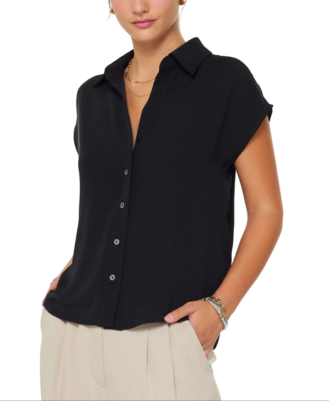 Classic collar neckline with button-down top
Short cap sleeves
Relaxed fit
Sustainable lightweight fabric
Gentle cycle wash in cold water
100% RECYCLED POLY