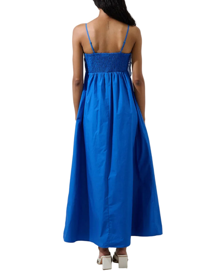 Modern romance in full bloom. This stunning maxi dress features a soft neutral skirt paired with a statement floral bodice that adds texture. The delicate straps and structured top create a flattering, feminine shape, while the flowing skirt brings effortless elegance with every step. Perfect for special occasions, sunset dinners, or any moment that calls for understated drama.
- Embroidered