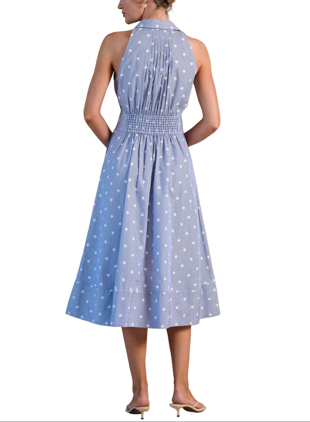 Effortless elegance meets timeless style with this sleeveless midi dress, featuring a striking blue and white star print. The relaxed fit and midi length create a flattering silhouette perfect for warm weather occasions, from casual outings to garden parties. Pair with sandals for a breezy daytime look or dress up with heels for evening wear. A versatile wardrobe essential that transitions seamlessly from season to season.