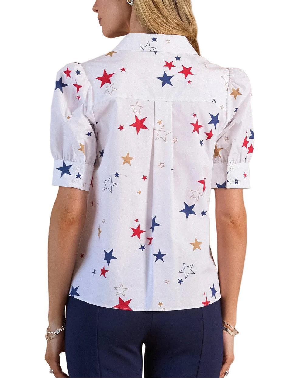 Brighten your wardrobe with this charming star printed short sleeve blouse. The playful multi-color star pattern adds a cheerful touch to everyday outfits, while the relaxed short sleeves keep you comfortable through warm weather. Perfect for casual styling with jeans or dressing up with tailored trousers. A versatile piece that transitions effortlessly from day to night.