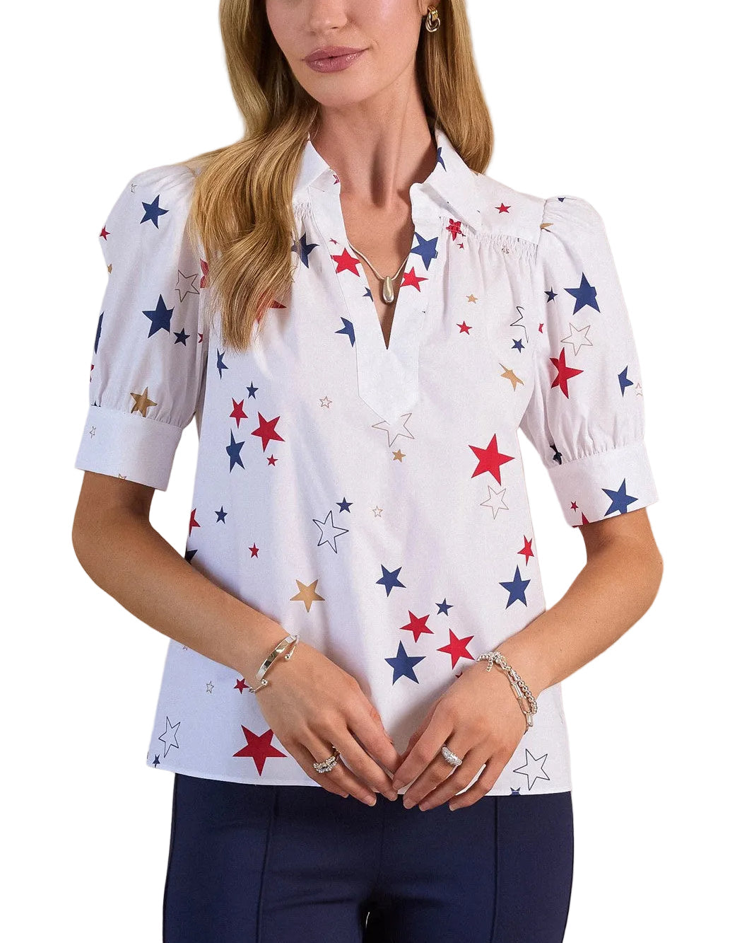 Brighten your wardrobe with this charming star printed short sleeve blouse. The playful multi-color star pattern adds a cheerful touch to everyday outfits, while the relaxed short sleeves keep you comfortable through warm weather. Perfect for casual styling with jeans or dressing up with tailored trousers. A versatile piece that transitions effortlessly from day to night.