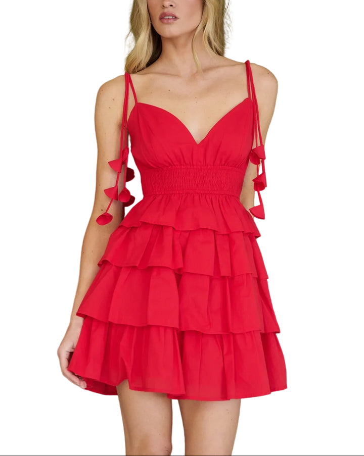 The Wynne Ruffle Tiered Mini Dress brings effortless elegance to your wardrobe. Crafted with cascading ruffled tiers, this mini dress features a flattering silhouette that moves beautifully with you. The rich red hue makes a bold statement, perfect for date nights, parties, or elevated casual occasions. Soft, breathable fabric ensures all-day comfort, while the tiered design adds romantic dimension and visual interest. A versatile piece that pairs seamlessly with heels, sneakers, or boots.