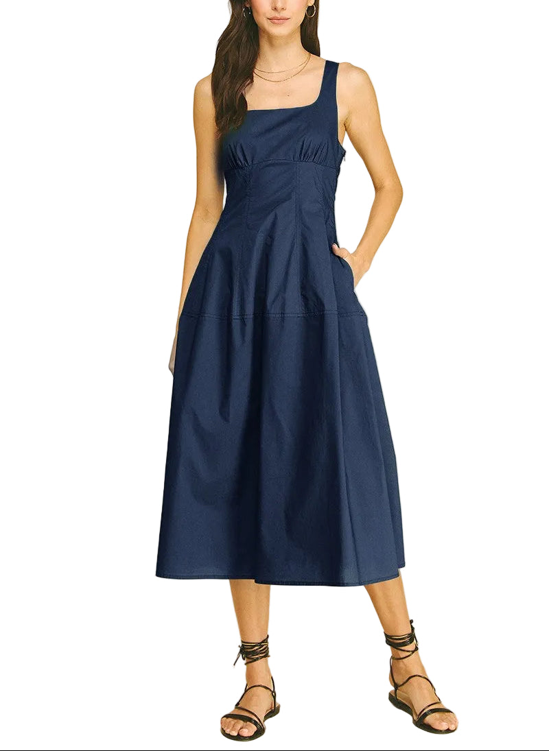 The Marisa Midi Dress offers effortless elegance for any occasion. This sleeveless design features a flattering midi length that skims the body gracefully, making it perfect for warm weather styling. The clean, minimalist silhouette pairs easily with sandals for casual outings or heels for evening events. Versatile and comfortable, it&
