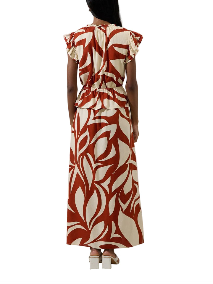 Elevate your wardrobe with the Astra Ruffle Maxi Dress in Brown. This sophisticated piece features delicate ruffles that add movement and dimension throughout, paired with practical short sleeves for versatile styling. The flowing maxi silhouette creates an effortlessly elegant look, perfect for everything from casual outings to special occasions. The rich brown tone complements all skin tones and pairs beautifully with your existing pieces. Comfortable, flattering, and timelessly chic.