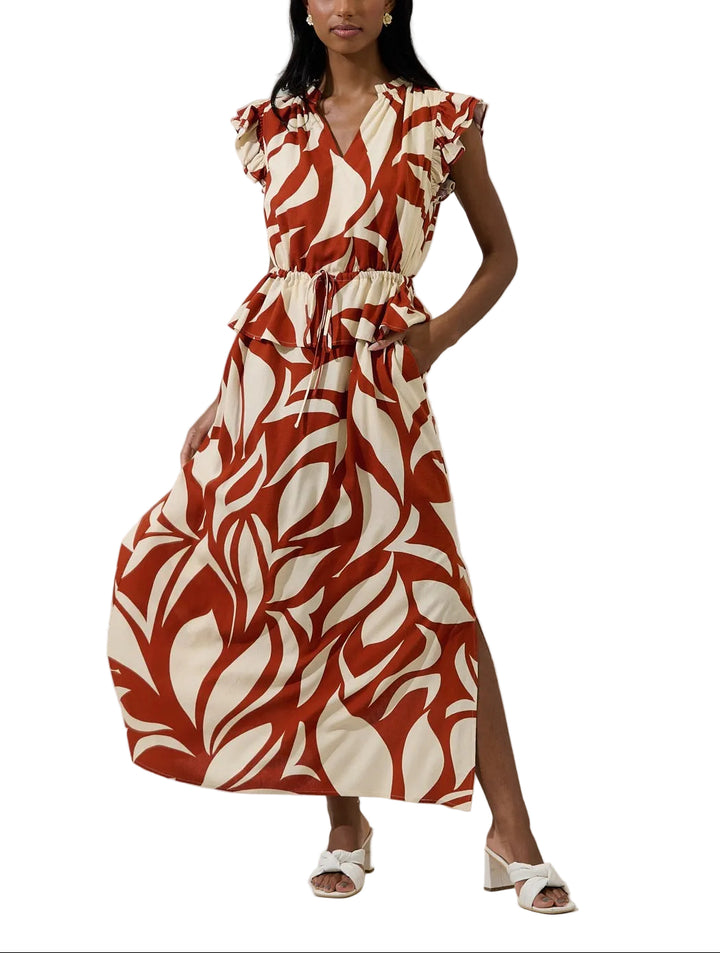 Elevate your wardrobe with the Astra Ruffle Maxi Dress in Brown. This sophisticated piece features delicate ruffles that add movement and dimension throughout, paired with practical short sleeves for versatile styling. The flowing maxi silhouette creates an effortlessly elegant look, perfect for everything from casual outings to special occasions. The rich brown tone complements all skin tones and pairs beautifully with your existing pieces. Comfortable, flattering, and timelessly chic.