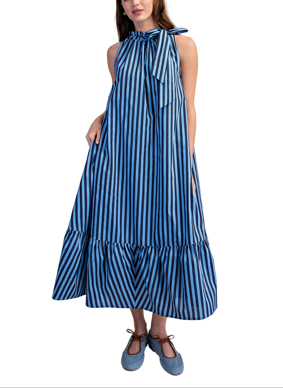 Effortless summer style meets timeless elegance with the Marisa Striped Midi Sleeveless Dress. This versatile piece features classic stripes throughout, a flattering sleeveless silhouette, and a charming ruffle neck tie that adds a playful touch. The midi length offers sophisticated coverage while keeping you cool and comfortable. Perfect for casual outings, weekend brunches, or dressed up for evening occasions. A wardrobe essential that transitions seamlessly from day to night.