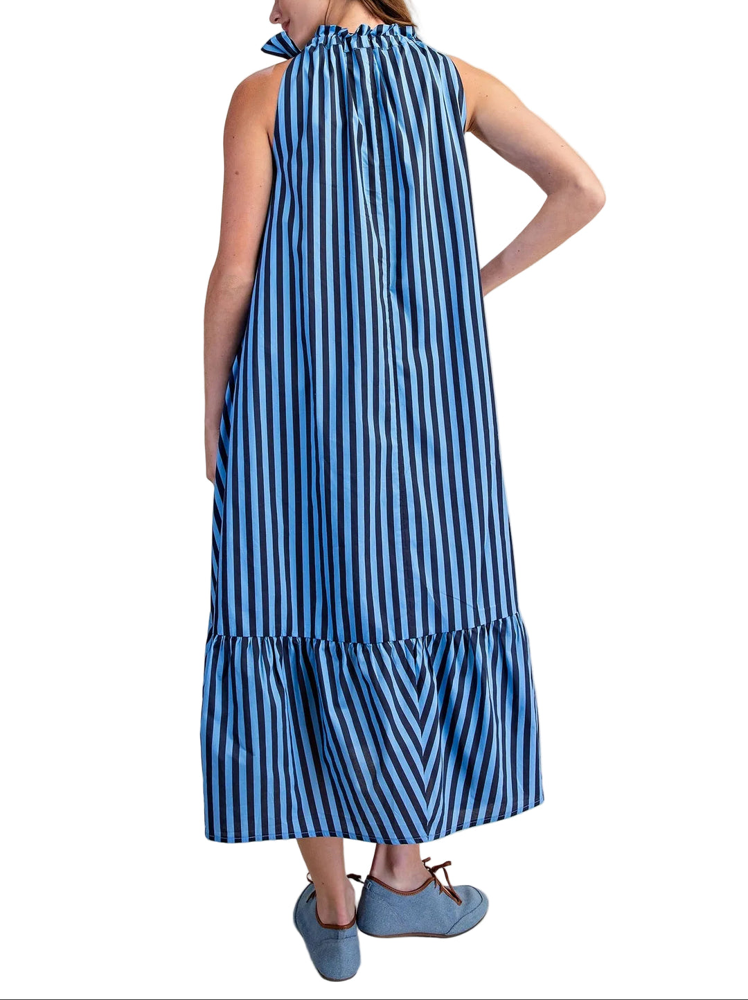 Effortless summer style meets timeless elegance with the Marisa Striped Midi Sleeveless Dress. This versatile piece features classic stripes throughout, a flattering sleeveless silhouette, and a charming ruffle neck tie that adds a playful touch. The midi length offers sophisticated coverage while keeping you cool and comfortable. Perfect for casual outings, weekend brunches, or dressed up for evening occasions. A wardrobe essential that transitions seamlessly from day to night.