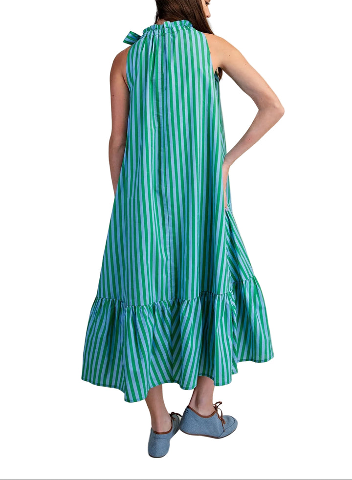 Effortless summer style meets timeless elegance with the Marisa Striped Midi Sleeveless Dress. This versatile piece features classic stripes throughout, a flattering sleeveless silhouette, and a charming ruffle neck tie that adds a playful touch. The midi length offers sophisticated coverage while keeping you cool and comfortable. Perfect for casual outings, weekend brunches, or dressed up for evening occasions. A wardrobe essential that transitions seamlessly from day to night.