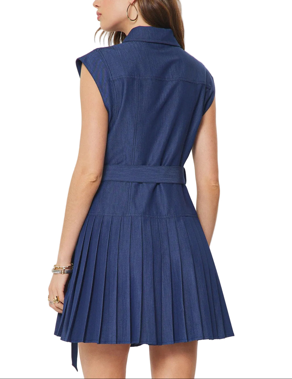 Effortless style meets timeless charm with this short sleeve button-down denim mini dress. Featuring a flattering pleated skirt that adds movement and dimension, this piece transitions seamlessly from casual weekends to dressed-up occasions. The classic button front and structured bodice offer a polished look, while the relaxed fit keeps you comfortable all day long. Perfect for pairing with sneakers, sandals, or boots.