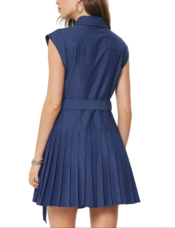 Effortless style meets timeless charm with this short sleeve button-down denim mini dress. Featuring a flattering pleated skirt that adds movement and dimension, this piece transitions seamlessly from casual weekends to dressed-up occasions. The classic button front and structured bodice offer a polished look, while the relaxed fit keeps you comfortable all day long. Perfect for pairing with sneakers, sandals, or boots.
