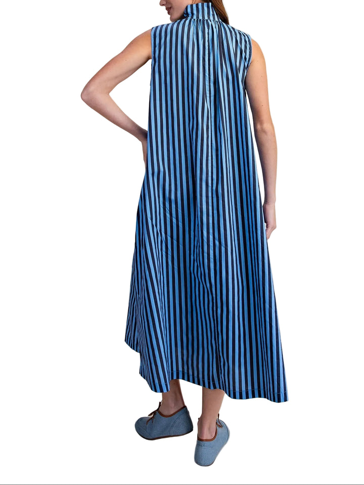 The Bess Sleeveless Striped Midi Dress combines timeless elegance with modern sophistication. Featuring a striking high collar and gleaming gold metal buttons, this piece makes an instant statement. The classic stripe pattern adds visual interest while the midi length offers versatile styling for both casual and dressy occasions. Sleeveless design keeps it light and breathable, perfect for layering or wearing solo. A wardrobe essential that transitions seamlessly from day to evening.