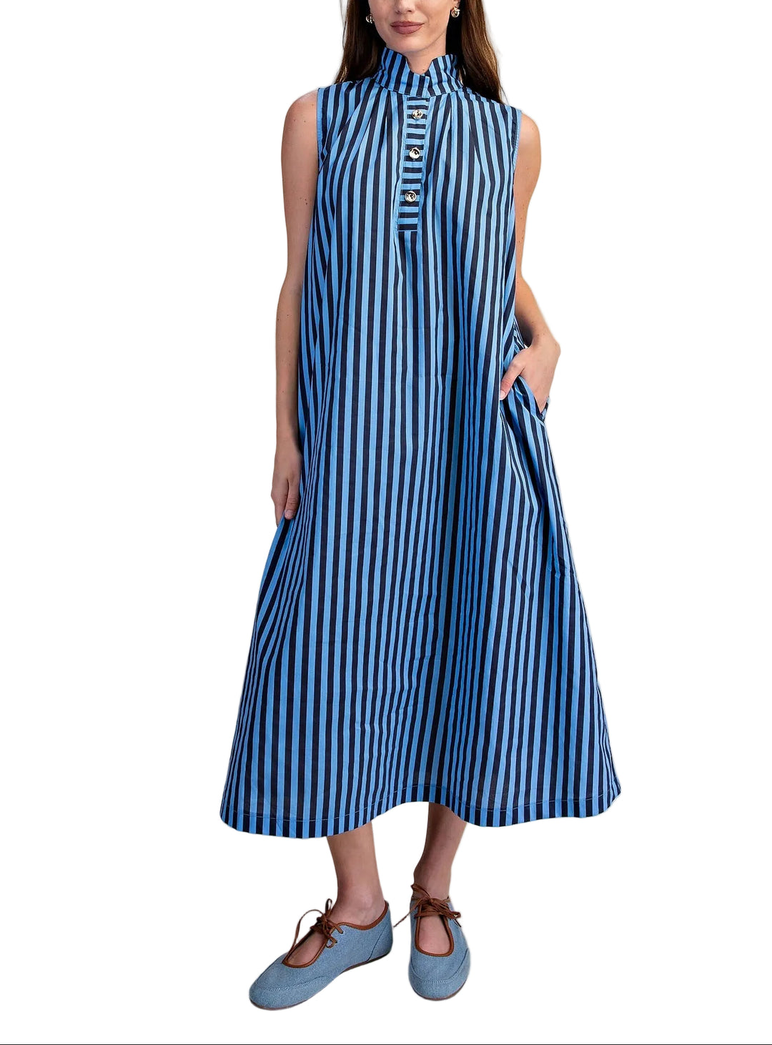 The Bess Sleeveless Striped Midi Dress combines timeless elegance with modern sophistication. Featuring a striking high collar and gleaming gold metal buttons, this piece makes an instant statement. The classic stripe pattern adds visual interest while the midi length offers versatile styling for both casual and dressy occasions. Sleeveless design keeps it light and breathable, perfect for layering or wearing solo. A wardrobe essential that transitions seamlessly from day to evening.